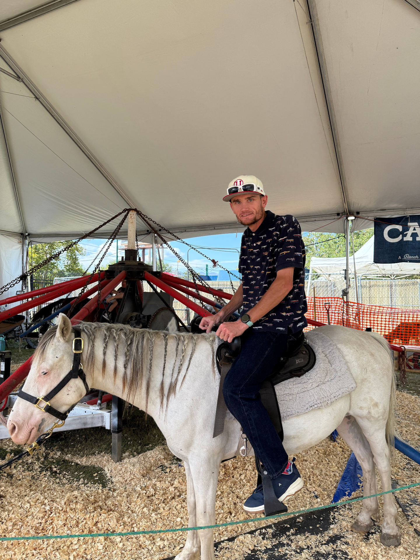 A Liberty Living client enjoying a horseback ride at a community fair